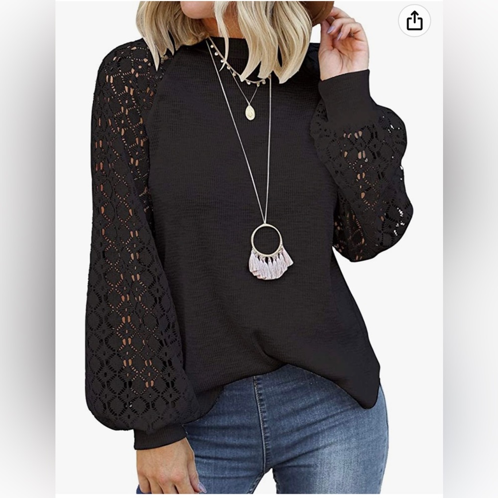 Women’s black lace long sleeve blouse. Loose fit. Size large true to size.